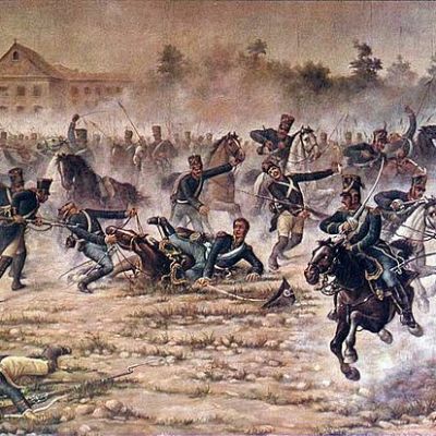 “Cargar a caballo sable en mano”